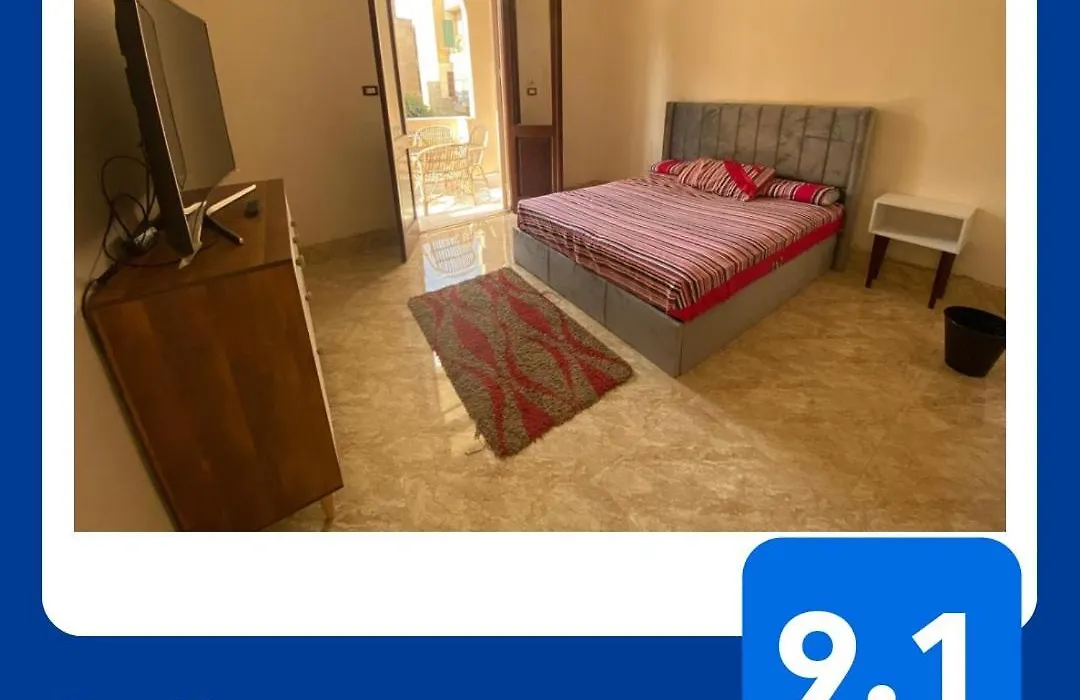 Comfy Private Room With Big Sunny Balcony Near Cairo Airport مكان مودرن للاقامة دقائق من مطار القاهرة الدولى-1